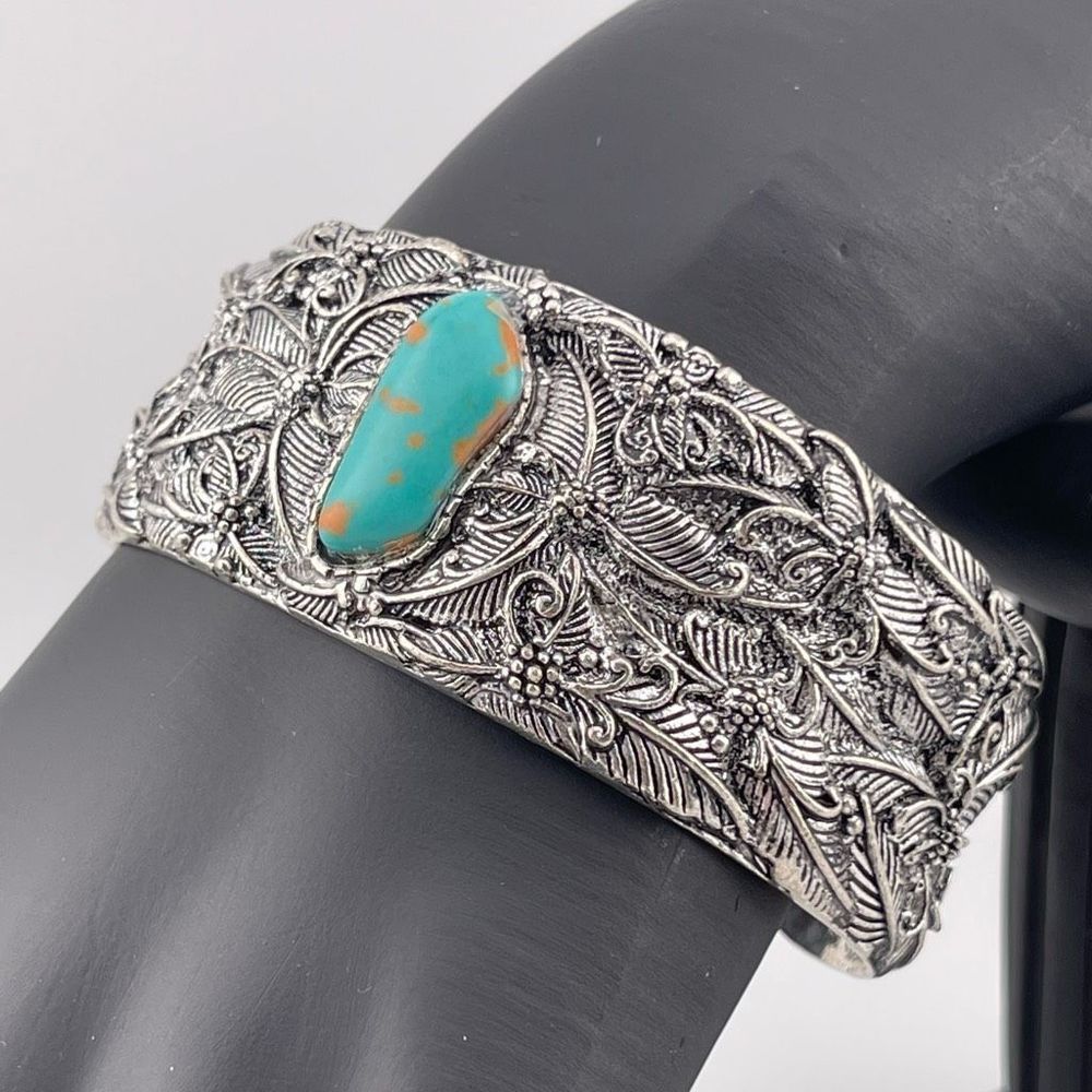 Silver plated southwestern style cuff faux turquoise